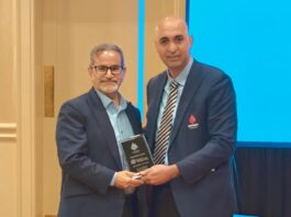 President of Cricket Canada, receives a souvenir from former President Raspal Bajwa during the AGM 2024 in Toronto (Photo: Adrees Malik/Current Line)